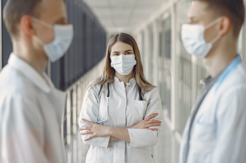 Woman-in-White-Coat-Wearing-White-Face-Mask