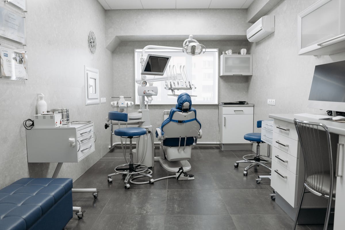 Dental Clinic with White Walls and Gray Floor