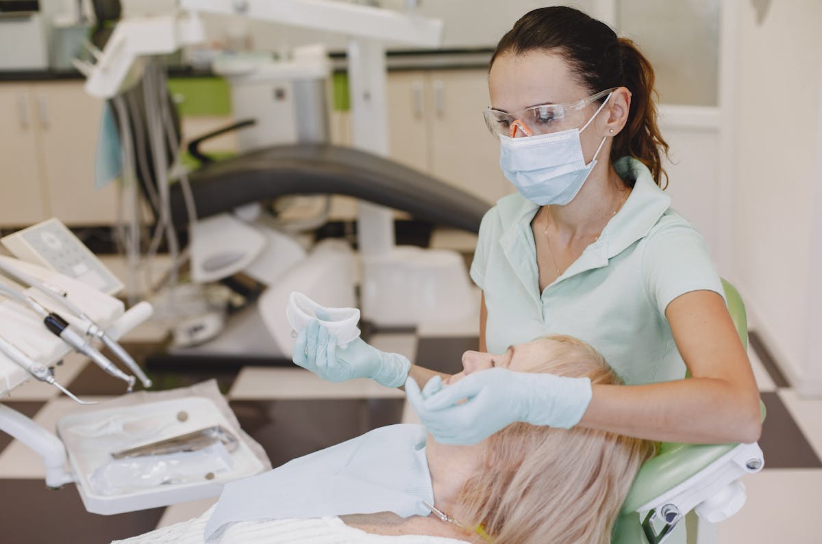 Photo of a Woman during a Visit at the Dentist